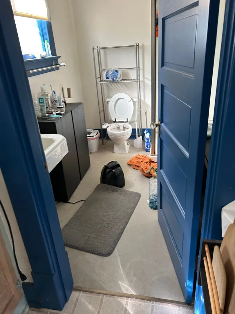 Bathroom being dried out after a sewage backup